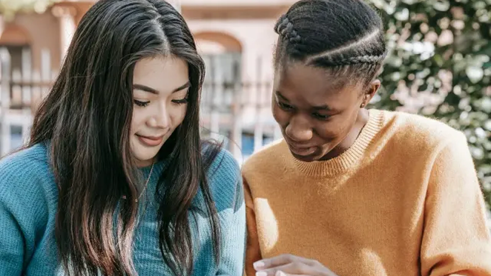 People streaming content on a mobile device